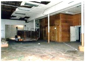 Before: fire engine garage on the ground floor before construction